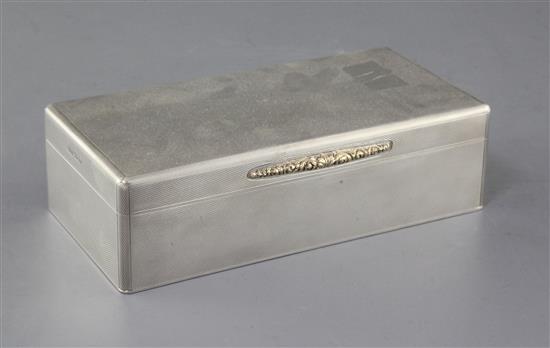 A 1930s engine turned silver rectangular cigarette box by Padgett & Braham Ltd, 17.8cm.